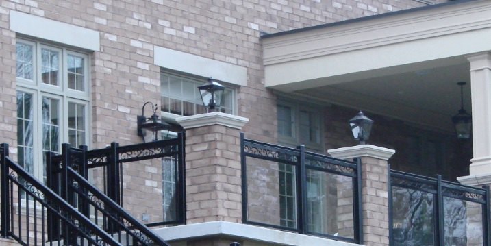 GR6 glass railing with decorative scroll header