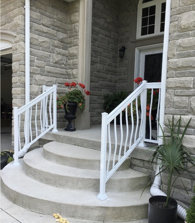 R3 white aluminum railing on a porch